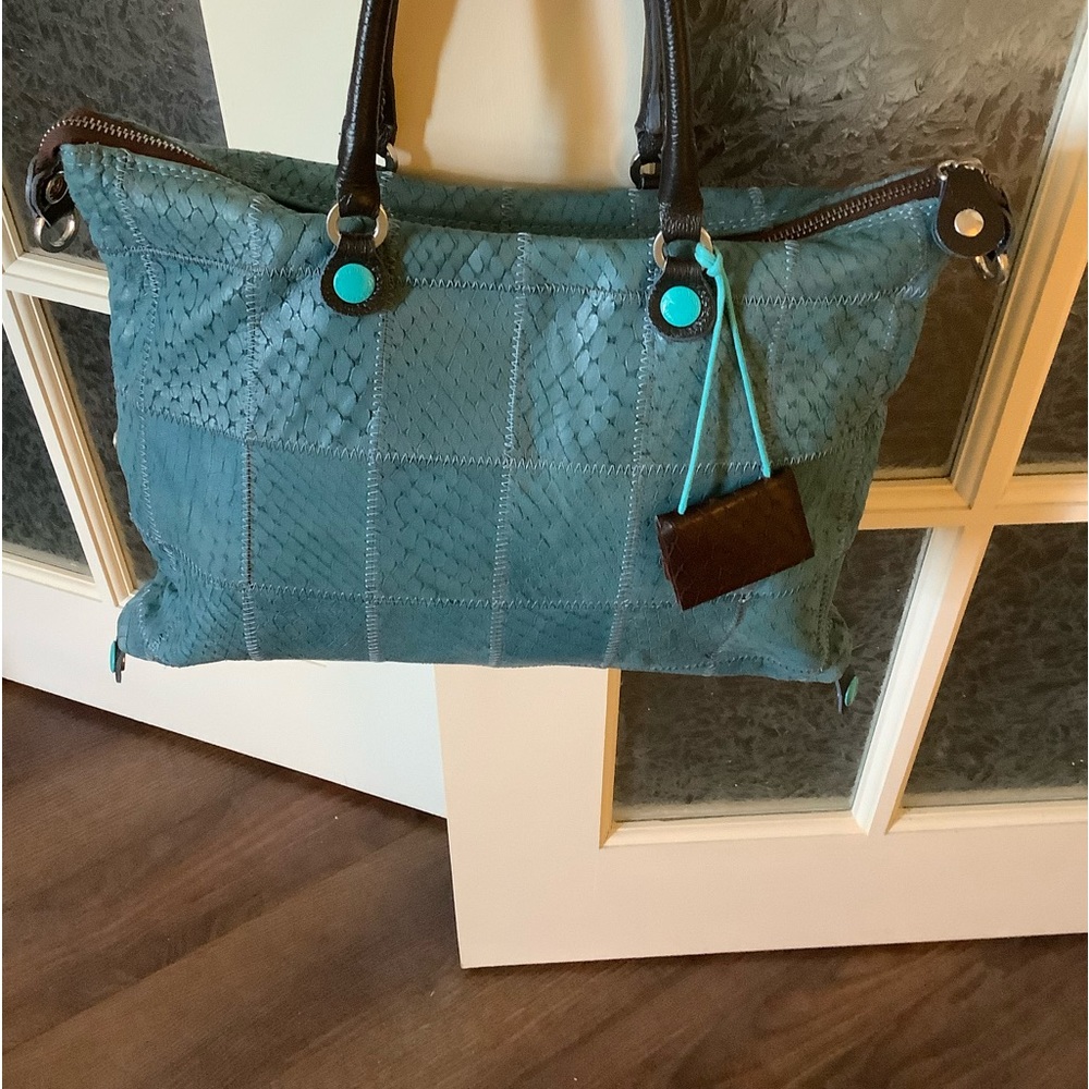 Firm Price GABS Leather Convertable Bag. Used a couples of times.